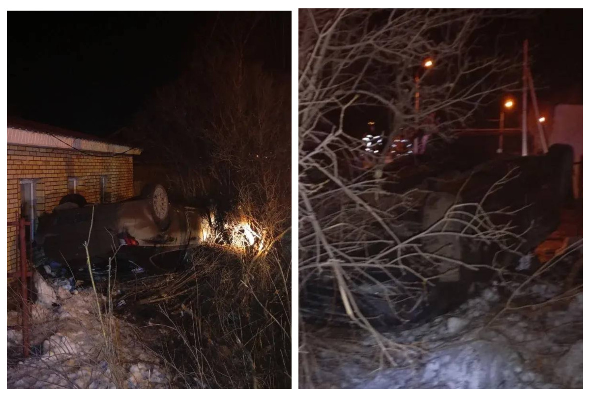 Опрокинувшийся автомобиль снес забор жилого дома в Магнитогорске*1